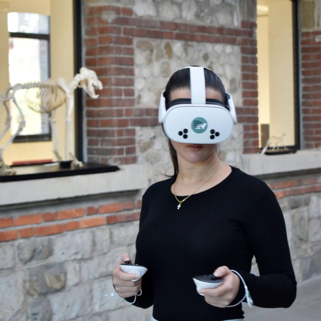 A girl wears a virtual reality visor